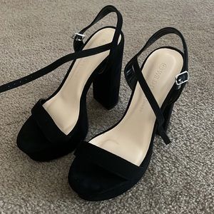 WILD DIVA black platform heels.